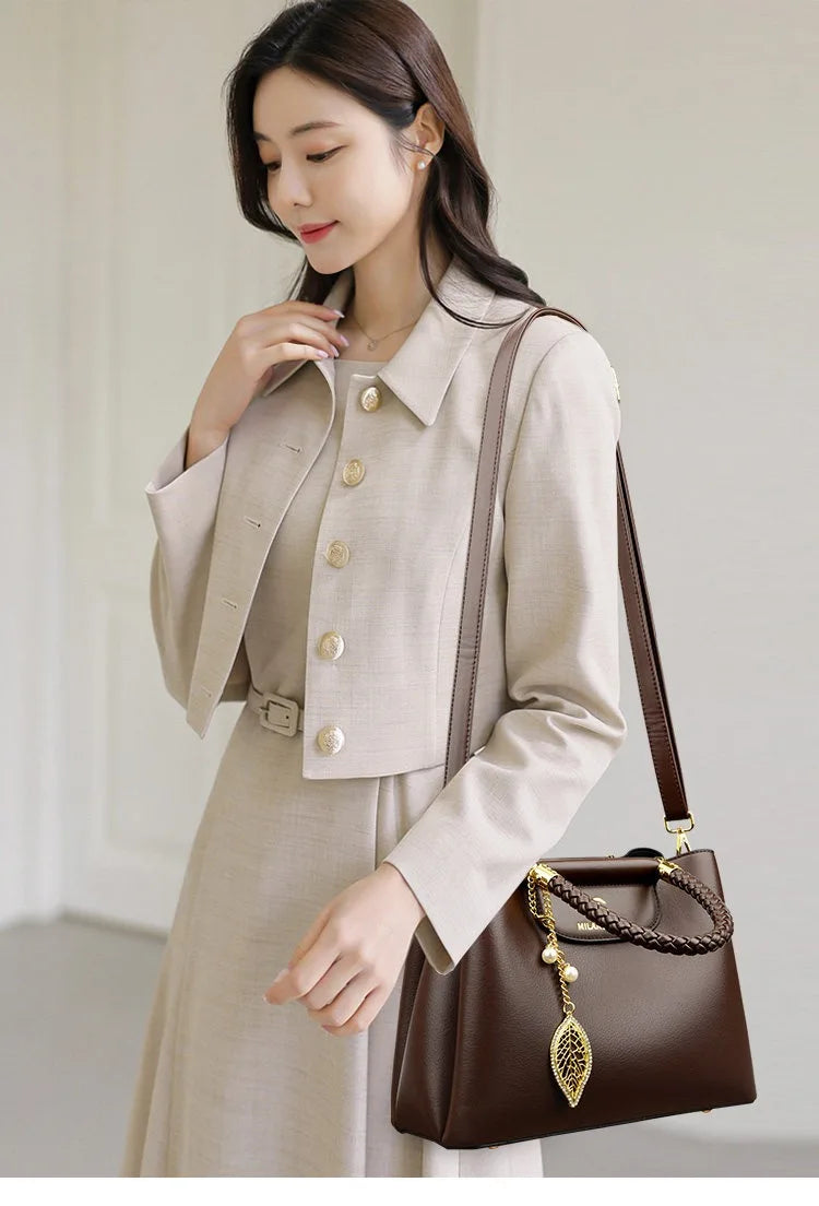 Real leather cowhide handbag for women 2026 new fashionable and versatile women's shoulder bag, large capacity crossbody mother