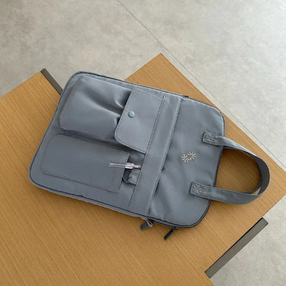 Large-capacity 13-inch laptop bag for men and women commuting business trip shoulder slung handbag.