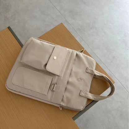 Large-capacity 13-inch laptop bag for men and women commuting business trip shoulder slung handbag.