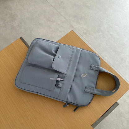 Large-capacity 13-inch laptop bag for men and women commuting business trip shoulder slung handbag.