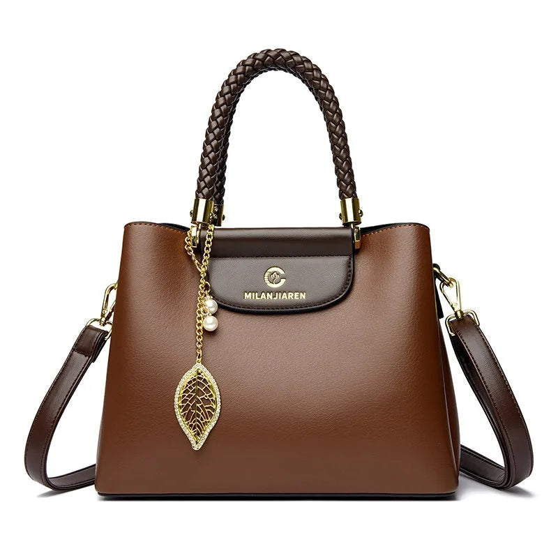 Real leather cowhide handbag for women 2026 new fashionable and versatile women's shoulder bag, large capacity crossbody mother
