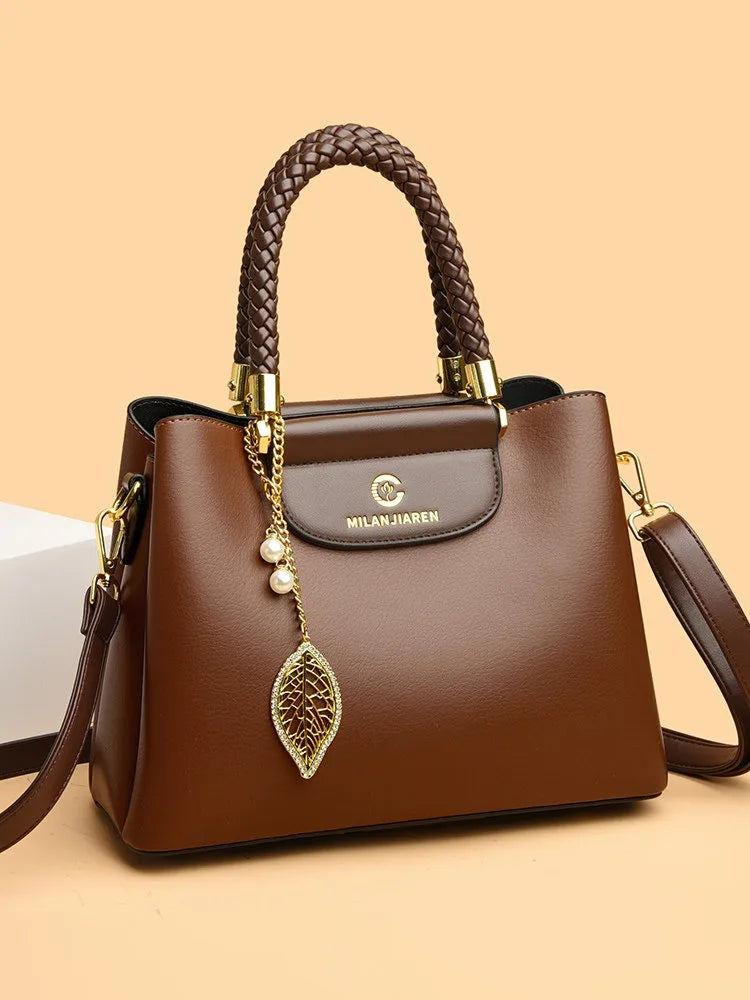 Real leather cowhide handbag for women 2026 new fashionable and versatile women's shoulder bag, large capacity crossbody mother