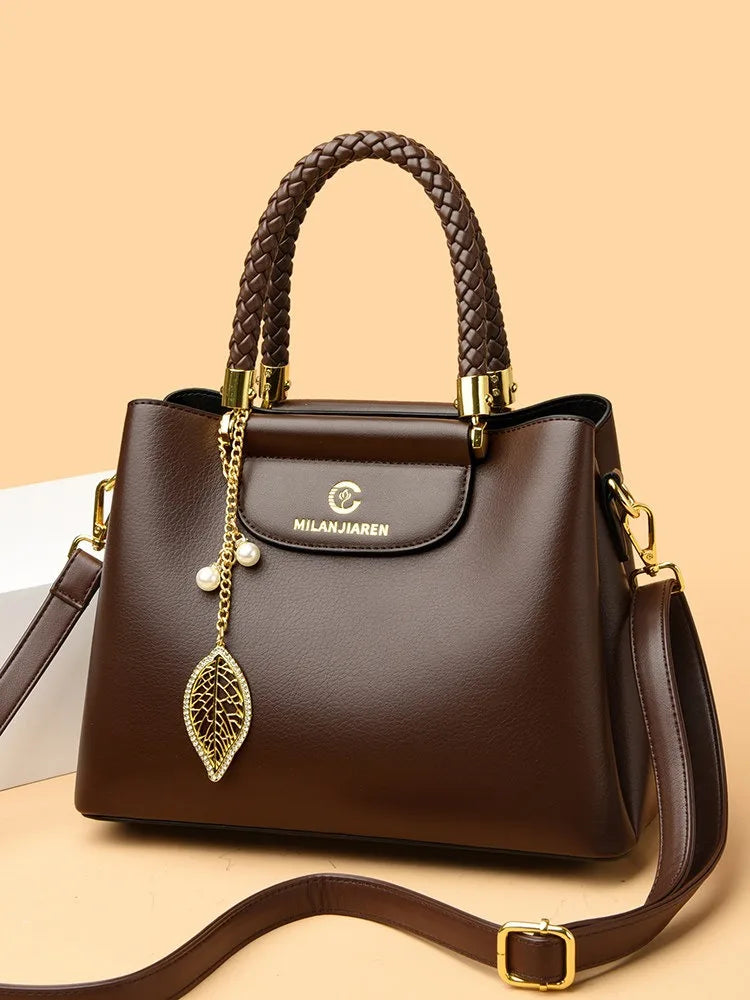Real leather cowhide handbag for women 2026 new fashionable and versatile women's shoulder bag, large capacity crossbody mother